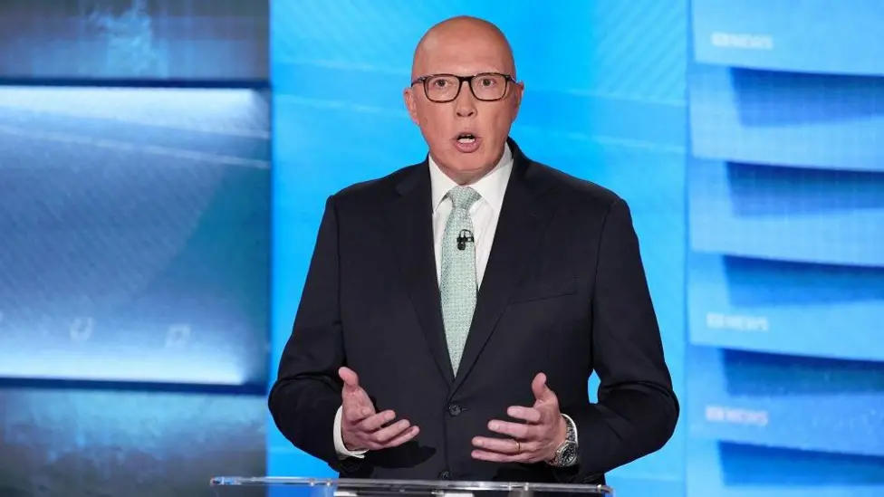 Australia opposition leader clarifies he believes in climate change after debate